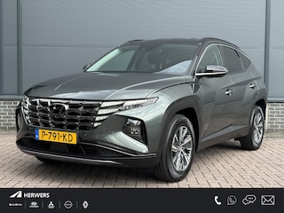 Hyundai Tucson 1.6 T-GDI HEV Comfort Smart / Afneembare Trekhaak / 1650 kg Trekgewicht / Stoel en Stuurverwarming / Navigatiesysteem / Apple Carplay / Android Auto / Adaptieve Cruise Control / Achteruitrijcamera /