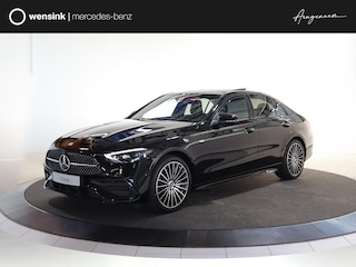 Mercedes-Benz C-klasse 300e Business Solution AMG | Panoramaschuifdak | Nightpakket | Digital Light | 19" LM velgen | Dodehoekassistent | 360° camera | Stoelverwarming | Sfeerverlichting |
