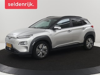 Hyundai Kona EV Fashion Design 64 kWh | SOH 94.6% | Leder | Head-up | Trekhaak | Adaptive cruise | Carplay | Stoelverwarming | Krell Sound | Dodehoek detectie |