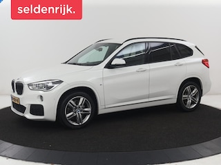 BMW X1 sDrive20i High Executive | Alcantara | Stoelverwarming | Adaptive cruise | Head-up | Camera | Park assist | Climate control | Navigatie | Bluetooth | Elektrische achterklep