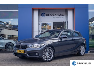 BMW 118i High Executive | Leder | Navi | Parkeersensoren | Stoelverwarming | Keyless | Cruise Control | Cruise control | Electronic climate controle | Keyless start