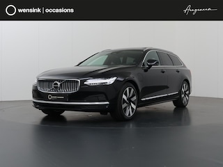 Volvo V90 2.0 T6 Plug-in hybrid AWD Plus Bright | Panoramadak | Trekhaak | Full Led Koplapen| Camera | Verwarmde achterbank | Apple CarPlay/Android Auto | Harman/Kardon Audio | Comfortstoelen | Adaptieve Cruise Control | DAB | Ele. verstelbare stoelen + Geheugen | Standkachel | LED | Navigatie | Sfeerverlichting | Stuur/stoelverwarming |