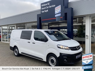 Opel Vivaro 1.5 CDTI L3H1 DC Selection / 6-Persoons / Cruise-Control / Trekhaak / Zijschuifdeur-Rechts / Houten-Vloer / Zijwandbekleding / Apple-Carplay & Android-Auto / Navi / Radio-Bluetooth / Airco / 16'' All-Seasons / ENZ.