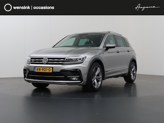 Volkswagen Tiguan 1.4 TSI ACT Highline R-Line | Sportstoelen | Virtual Cockpit | Navigatie | Camera | Trekhaak | DAB | Apple CarPlay/Android Auto | Panoramadak | Stoelverwarming | Adaptieve Cruise Control |