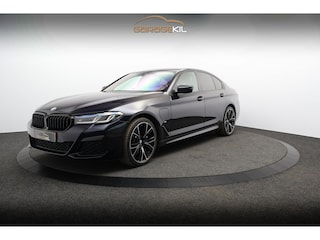 BMW 520e Business Edition Plus Laser / Comfort stoelen / Elek. verstel. stoelen / 20''LM velgen / Privacy Glass / Carbon zwart / Leder