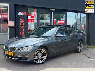 BMW 320i High Executive | Airco | Cruise | Navi | Leer
