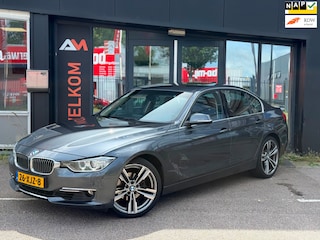 BMW 320i High Executive | Airco | Cruise | Navi | Leer