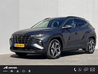 Hyundai Tucson 1.6 T-GDI PHEV Comfort Smart 4WD / Fabrieksgarantie tot 06-2028 / Accu SoH 100 % / Dealer onderhouden / Navigatie / Camera / Apple Carplay Android / Stuur- en stoelverwarming / 19" LM wielen /