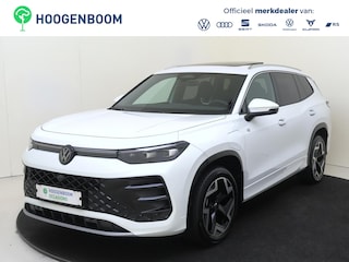 Volkswagen Tayron 1.5 eHybrid R-Line Edition | SoH 95% | Panoramadak | Trekhaak | Adaptieve demping | 360 camera | ErgoActive stoelen | Navigatie | Adaptieve cruise control | Stoel- en stuurwielverwarming |