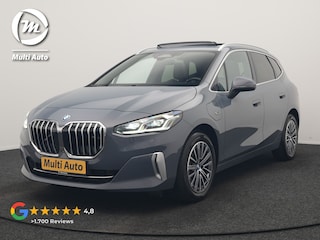 BMW 2-serie Tourer 225e xDrive Luxury Line PHEV 245pk Dealer O.H | Trekhaak Af Fabriek | Panodak | Adaptive Cruise | Lederen Sportstoelen Massage & Memory | Stoelen & Stuur Verwarmd | Blis | Sfeerverlichting | Apple Carplay | Widescreen Navigatie | Plug In Hybrid |