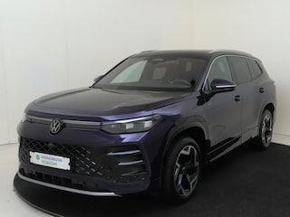 Volkswagen Tayron 1.5 eHybrid R-Line Edition | SoH 99% | Panoramadak | Trekhaak | Adaptieve demping | Head-up display | Harman/kardon | 360 camera | Stoelverwarming voor en achter | Parkeerassistent |