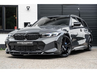 BMW 3-serie Touring 330e xDrive Pano H&K Trek Grote Accu 360