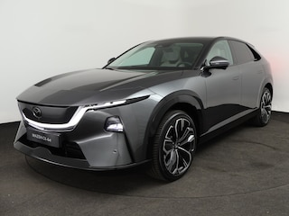 Mazda CX-6e 78 kWh Takumi | Alarmsysteem | Automatisch dimmende binnenspiegel met randloos design | Draadloze Apple CarPlay en Android Auto™