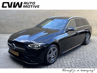 Mercedes-Benz C-klasse 300 e AMG Line | Sfeerverlichting | Half leder | 360 camera | Navigatie | Apple CarPlay | Stoelverwarming | Dodehoekdetectie | 18 inch AMG velgen | LED | DAB | Keyless | Elektrische achterklep | Volledig onderhouden