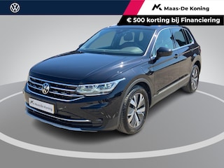 Volkswagen Tiguan 1.4TSIeHybrid/150PK R-Line Business+ · Panoramadak · Leder · Trekhaak · Camera · Apple/Android Car Play · Stoelverwarming · Dodehoeksensoren ·