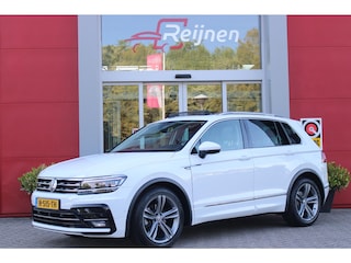 Volkswagen Tiguan 1.5 TSI 150PK AUTOMAAT HIGHLINE BUSINESS R | PANORAMA SCHUIF/KANTEL DAK | LEDEREN BEKLEDING | BESTUUDERSSTOEL ELEKTRISCH VERSTELBAAR MET GEHEUGENFUNCTIE | ELEKTRISCH WEGKLAPBARE TREKHAAK | IQ LIGHT KOPLAMPEN | VIRTUAL DISPLAY | DRAADLOZE APPLE CARPLAY/ANDROID AUTO | NAVIGATIE | 19" LICHTMETALEN VELGEN | ELEKTRISCH BEDIENBARE ACHTERKLEP | GETINTE ACHTERRUITEN | CAMERA VOOR + ACHTER | PARKEERSENSOREN VOOR + ACHTER | STOEL VERWARMING |