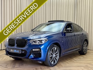 BMW X4 xDrive20i *M-Sport* Phytonicblau / Panoramadak / Leder / HUD / Stoelverwarming / Camera / 20"LMV