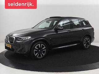 BMW iX3 Executive 80 kWh | SOH 93,8% | Panoramadak | Leder | Stoelverwarming | Adaptive cruise | Carplay | Sfeerverlichting | Camera | Park assist | Elektrische achterklep | PHEV