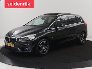 BMW 2-serie Tourer 220i High Executive | Panoramadak | Leder | Memory | Stoelverwarming | Cruise control | Head-up | Park assist | Elektrische achterklep | Trekhaak