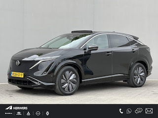Nissan Ariya Evolve 91 kWh / SOH 99% / Stoelverwarming voor en achter / Schuif-kantel dak / Stoelventilatie / Stuurverwarming / 100% dealer onderhouden / Elektrisch verstelbare stoelen met geheugen / Elektrische achterklep / Adaptieve cruise control / Apple Carplay/Android Auto /
