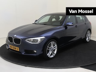 BMW 118i Upgrade Edition | airco | bi-xenon koplampen | cruise control | lederen bekleding | navigatiesysteem full map | voorstoelen verwarmd |