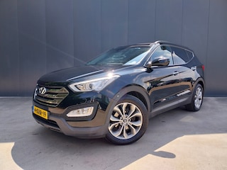 Hyundai Santa Fe 2.4i GDI 4WD i-Catcher OPEN DAK CAMERA CRUISE ECC NAVI XENON LED LEER TREKHAAK 4X4