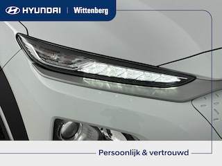Hyundai Kona EV FASHION 64 kWh | TREKHAAK | SoH 93,1% | DODEHOEK DETECTIE | PDC | 3 FASE | WARMTEPOMP | CAMERA | CLIMA | CRUISE ADAPT. | NAVI | PRIVACY GLASS | DAKRAILING | APPLE CAR PLAY & ADROID AUTO |