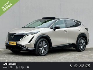 Nissan Ariya Evolve 91 kWh / SOH 99% / Stoelverwarming voor en achter / Schuif-kantel dak / Stoelventilatie / Stuurverwarming / 100% dealer onderhouden /  Elektrisch verstelbare stoelen met geheugen / Elektrische achterklep / Adaptieve cruise control / Apple Carplay/Android Auto / Navigatie /