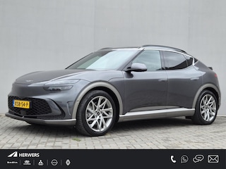 Genesis GV60 Long Range Sport 87,2 kWh AWD / SOH 98% / Fabrieksgarantie tot 05-2027 / Dealer onderhouden / Trekhaak afneembaar / CCS snelladen / Trekgewicht 1600 kg / Head Up Display / Panoramadak / Warmtepomp / Stuur- & Stoelverwarming / Rondomzicht camera / Stoelventilatie / Elektrische achterklep /