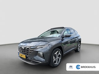 Hyundai Tucson 1.6 T-GDI 265pk PHEV Premium Sky 4WD | Carplay | Leder | Panoramadak | 19-inch Velgen | Navigatie | Camera | Adaptive Cruise | Stoelverwarming/ventilatie | Stuurverwarming | DAB | BLIS | Zonneschermen achter |