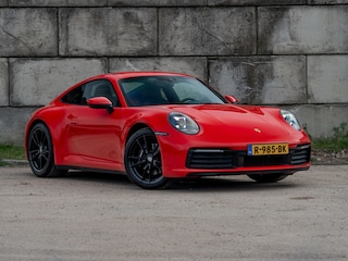 Porsche 911 Carrera 992 3.0 PDK 385PK (2020) | Sportuitlaat | Schuifdak | Sportstoelen | DealerOH | Compl. Historie | Indisch Rood