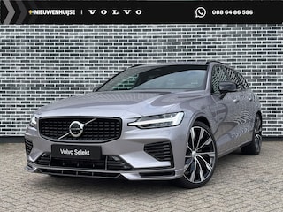 Volvo V60 T6 Plug-in hybrid AWD Ultra Dark | Heico bodykit | Google | Long Range | Schuif-/Kanteldak | Adaptieve Cruise Control | DAB | Head-Up Display | Camera | Stoelverwarming Voor + Achter | Harman Kardon Audio | Getint Glas | Zitverlenging | Elek. Stoelen | Memory | 19" LM
