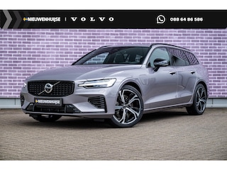 Volvo V60 T6 Plug-in hybrid AWD Ultra Dark | Heico bodykit | Google | Long Range | Schuif-/Kanteldak | Adaptieve Cruise Control | DAB | Head-Up Display | Camera | Stoelverwarming Voor + Achter | Harman Kardon Audio | Getint Glas | Zitverlenging | Elek. Stoelen | Memory | 19" LM