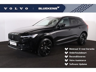 Volvo XC60 2.0 T6 Plug-in hybrid AWD Essential - Black Edition - Fiscale waarde € 64.581 - IntelliSafe Assist & Surround - Verwarmde voorstoelen, stuur & achterbank - Parkeersensoren & camera achter - Draadloze tel. lader - Extra getint glas -Donkere hemel - 21 inch LMV