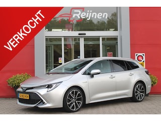 Toyota Corolla Touring Sports 2.0 Hybrid 180PK AUTOMAAT EXECUTIVE JBL | STOEL VERWARMING | DODEHOEK DETECTIE | NAVIGATIE | APPLE CARPLAY/ANDROID AUTO | CLIMATE CONTROL | ADAPTIVE CRUISE CONTROL | FULL LED KOPLAMPEN | KEYLESS ENTRY/START | ALL SEASON BANDEN | 18" LICHTMETALEN VELGEN | DAB+ RADIO | JBL AUDIO SSTEM | ELEKTRISCH BEDIENBARE ACHTERKLEP | ACHTERUITRIJ CAMERA | PARKEERSENSOREN VOOR + ACHTER | DRAADLOZE TELEFOONLADER | HEAD UP DISPLAY |