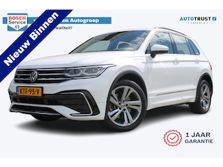 Volkswagen Tiguan 1.4 TSI eHybrid R-Line Business+ | Incl. 12 maanden garantie | SOH 92% | Stoel/stuurverwarming | Parkeercamera | Wegklapbare trekhaak | DAB radio | Apple carplay/Android auto | 100% dealer onderhouden |