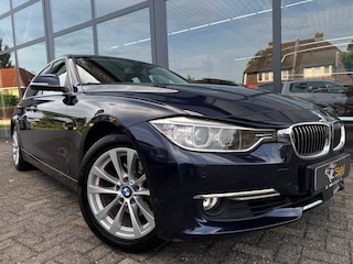 BMW 320i High Executive | Leer | Open dak