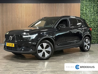Volvo XC40 T5 Recharge Plus Dark | Trekhaak | Harman Kardon | All Season banden | Bestuurdersstoel elektrisch geheugen | Adaptieve Cruise Control | Stoel en Stuurwielverwarming | Parkeercamera | Pilot Assist | BLIS Dode Hoek Detectie | Parkeersensoren voor+achter | Passagiersstoel elektrisch | 18 Inch | Zitting velenging voorstoelen | Keyless Drive | Climate Control L+R | Regensensor | Privacy Glass | Automatisch dimmende binnen en buitenspiegels | Elektrisch bedienbare achterklep | DAB Radio | Draadloos telefoon opladen | Apple Carplay/Android Auto | Volvo On Call met mobiele App functie | Onyx Black Metallic |
