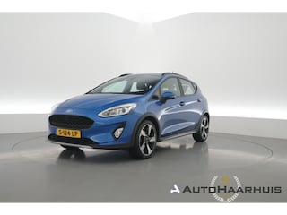 Ford Fiesta 1.0 EcoBoost Hybrid Active X | Rijklaar! | Trekhaak | WinterPack | E-Spiegels | Cruise | PDC | Climate | App.Connect | Rijmodi | LED | Bluetooth | 5-Deurs | 17'' V