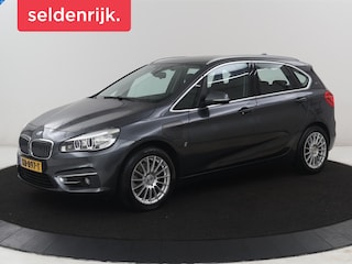 BMW 2-serie Tourer 225xe iPerformance Centennial High Executive | SOH 88,6% | Leder | Stoelverwarming | Adaptive cruise | Head-up | Navigatie | Bluetooth | Camera | Park assist | Elektrische achterklep | Trekhaak