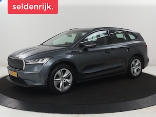Skoda Enyaq iV 60 | SOH 93,0% | Half leder | Cruise control | Carplay | Climate control | Lane assist | Park assist | Trekhaak | Sfeerverlichting | Navigatie | Bluetooth