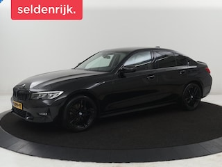 BMW 320i Executive Edition | Half leder | Cruise control | Navigatie | Bluetooth | Carplay | Park assist | Interieurverlichting | Virtueel dashboard | Climate control | Full LED | 18" velgen