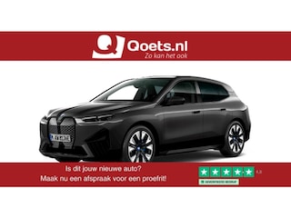 BMW iX xDrive40 Sportpakket - Trekhaak - Panoramadak - Multifunctionele stoelen voor - Getinte Ruiten -