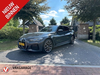 BMW i4 eDrive40 High Executive 84 kWh | M-Pakket | Schuifdak | Cruise Control adaptief met Stop&Go | NL-Auto |