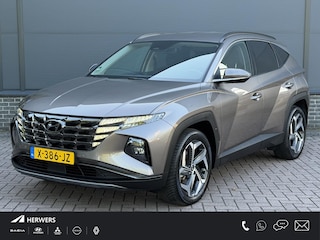 Hyundai Tucson 1.6 T-GDI PHEV Comfort Smart 4WD / Dealer Onderhouden / Trekhaak / SOH 100% / 1350KG Trekgewicht / Fabrieksgarantie tot 01-2029 / Stuur & Stoelverwarming / Elektrische Achterklep / Navigatie / Adaptief cruise control / Apple Carplay Android Auto / Krell Audio Systeem / Keyless Entry & Start /