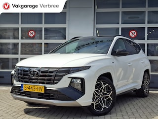 Hyundai Tucson 1.6 T-GDI HEV N Line Sky | Navigatie/Android/Apple Carplay | LMV 19" | Elektrisch Glazen Panoramadak | Adaptieve Cruise Control | Voorstoelen/Achterbank Verwarmd | Rondomzichtcamera | Airco Automatisch |