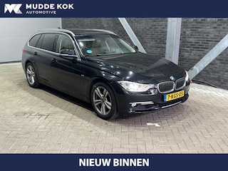BMW 3-serie Touring 320i Upgrade Edition | Trekhaak | Leder | Navigatie | PDC | Stoelverwarming