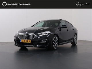 BMW 218i M Sport | Achteruitrijcamera | Memorystoel | Stoel en stuurwielverwarming | Panoramadak | Cruise control adaptief |
