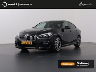 BMW 218i M Sport | Achteruitrijcamera | Memorystoel | Stoel en stuurwielverwarming | Panoramadak | Cruise control adaptief |