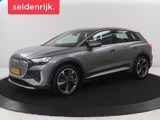 Audi Q4 40 77KWH 150 KW S-Line | SOH 96,3% | Half leder | Adaptive cruise | Stoelverwarming | Drive select | Navigatie | Carplay | Sfeerverlichting | Camera | Park assist | Elektrische achterklep